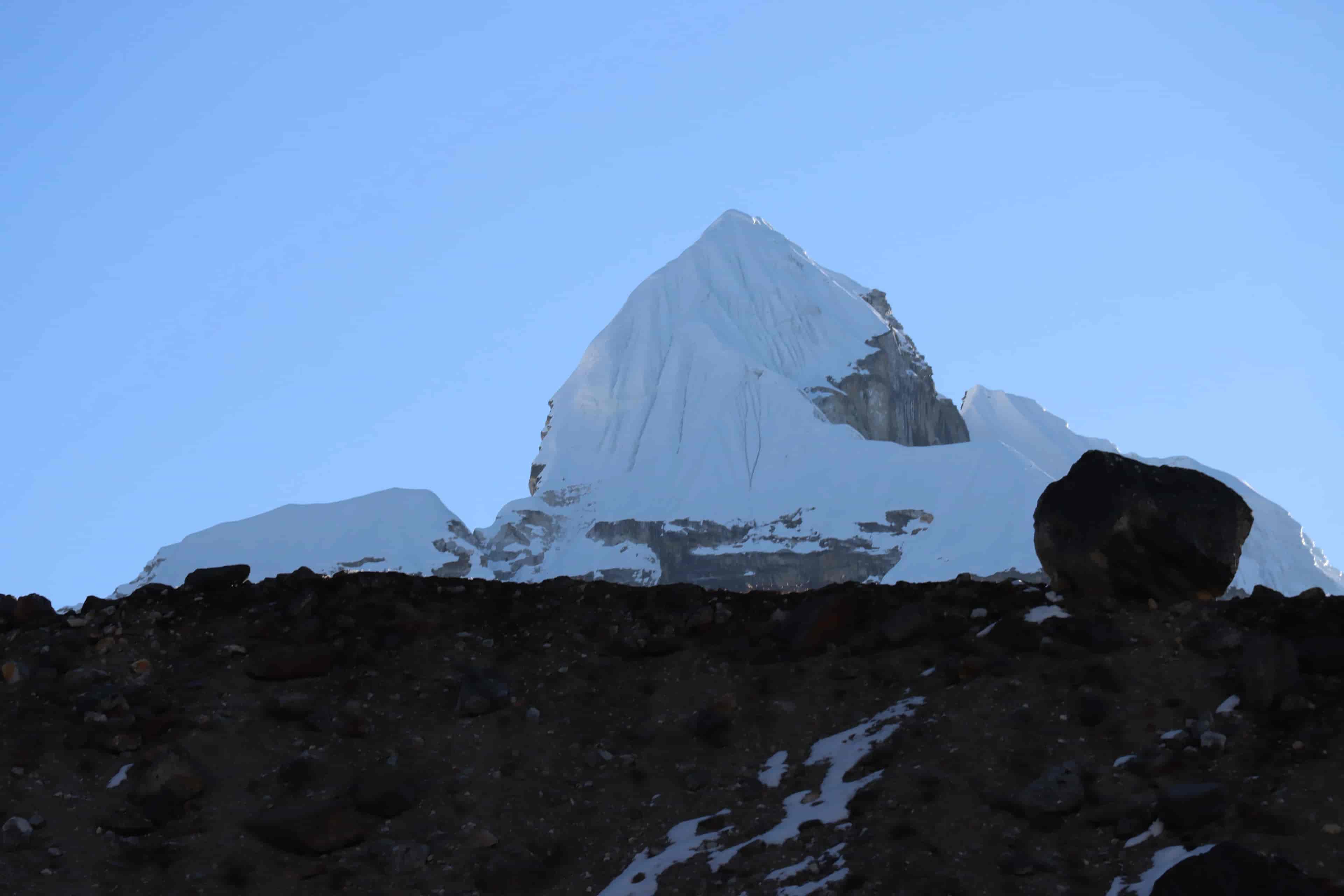 Sunrise lighting up Lobuche Peak summit during Himalayan expedition