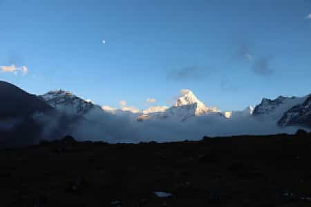 Dzongla village at dusk with Ama Dablam peak visible in the background