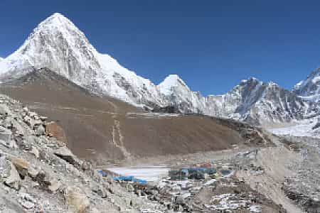 Pumori, Kala Patthar, and Gorakshep in one panoramic Himalayan frame under clear skies