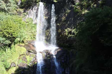Cascading waterfall near Benkar, a scenic stop on the trek to Namche Bazaar in the Khumbu region