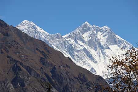 Distant view of Everest and Lhotse peaks rising above the Himalayas