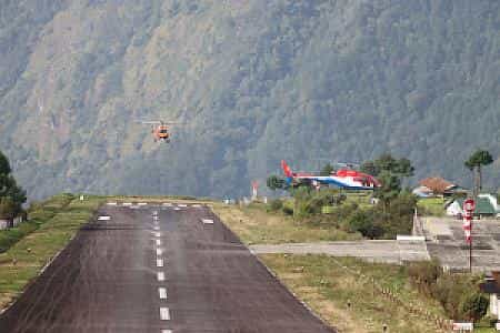 Tenzing-Hillary Airport in Lukla, gateway to Everest treks, with short runway and mountain backdrop