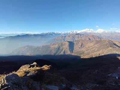 Himalayan panorama from Pikey Peak with distant snow-capped mountains