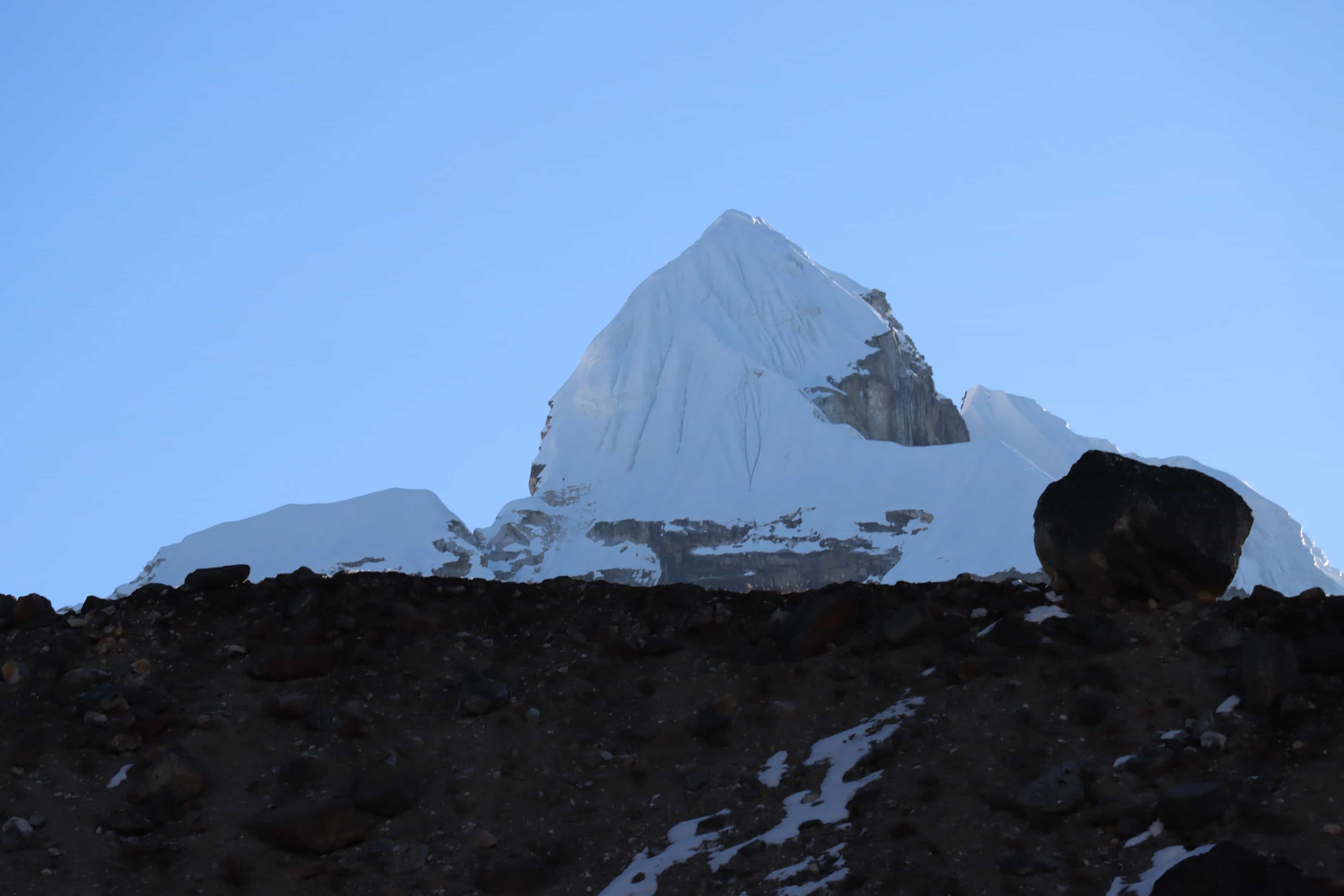 Sunrise lighting up Lobuche Peak summit during Himalayan expedition